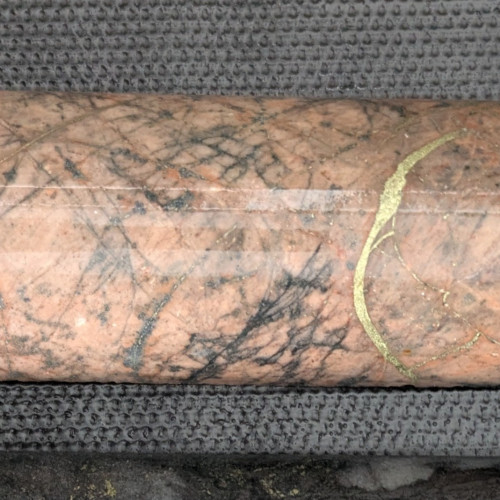 1.42% Cu, 0.104 g/t Au, 6.1 g/t Ag from 201.18 m to 201.48 m