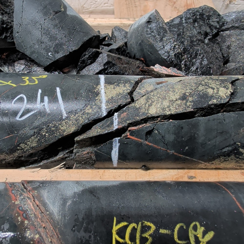 2.13% Cu, 0.16 g/t Au, 6.9 g/t Ag from 240.88 m to 241.18 m