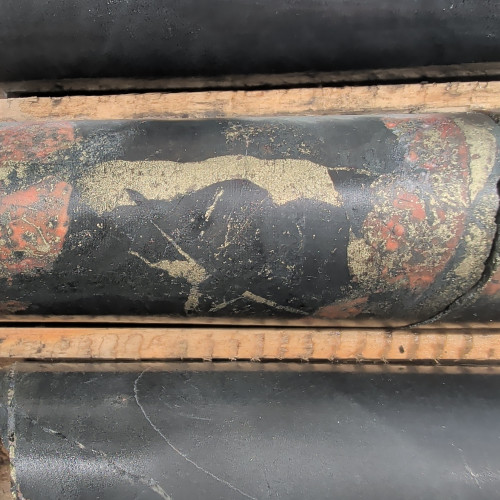 1.24% Cu, 0.091 g/t Au, 5.1 g/t Ag, 51 ppm Mo from 299 m to 299.5 m