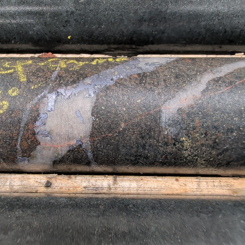 0.307% Cu, 0.042 g/t Au, 1.7 g/t Ag,  0.2% Mo from 276 m to 277 m