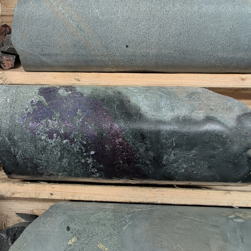 8.26% Cu, 1.15 g/t Au, 91.1 g/t Ag from 296.72 m to 297 m