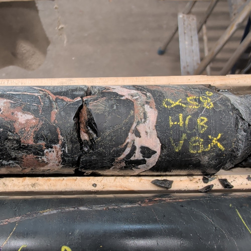 2.03% Cu, 0.261 g/t Au, 13.4 g/t Ag from 355 m to 356 m