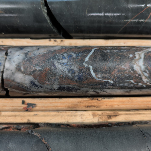 1.71% Cu, 0.21 g/t Au, 14 g/t Ag, 88 ppm Mo from 359 m to 360 m