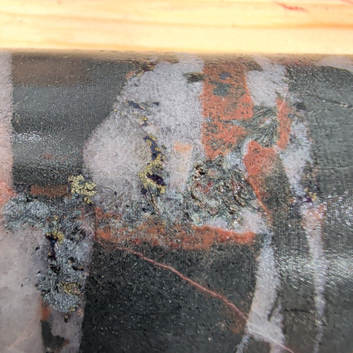 0.89% CuEq, 0.28% Cu, 0.08 g/t Au, 1.2 g/t Ag, 1030 Mo_ppm from 376.00m to 377.00m