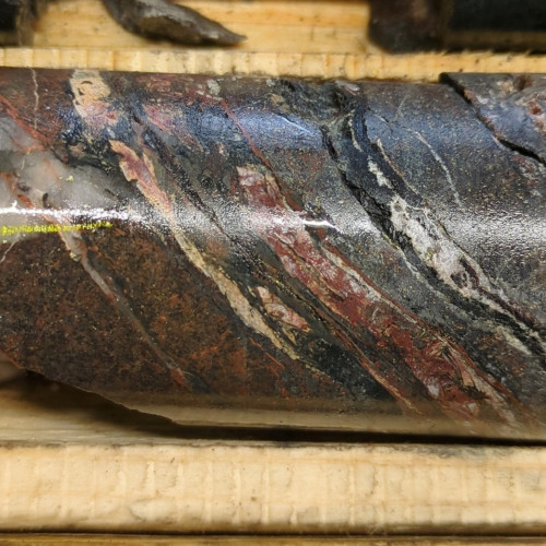 2.32% Cu, 0.04 g/t Au, 7.5 g/t Ag, 130 ppm Mo from 371.25m to 371.5m