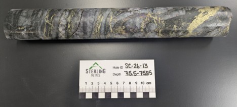 Chalcopyrite- and bornite-rich ribbon vein in SC-26-13 at approximately 75.5 m downhole. The sample returned 10.8% Cu, 16.6 g/t Au, 145 g/t Ag and 10 ppm Mo